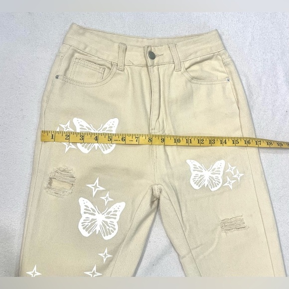 SHEIN Tan Boot Cut Jeans with White Butterfly Design - Picture 5 of 7